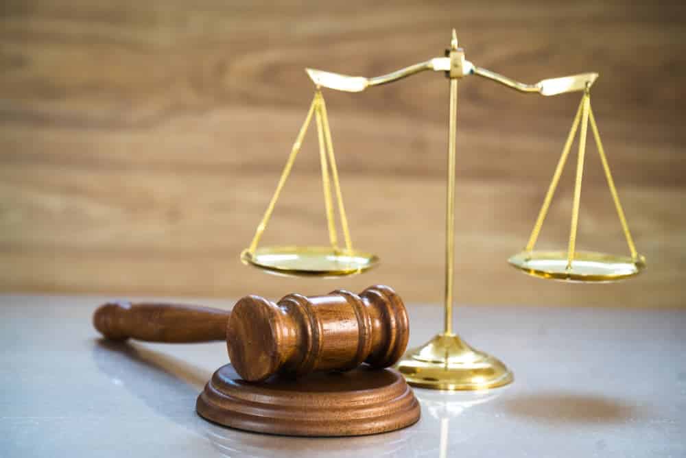 Judge’s gavel and scales of justice symbolizing law, legal proceedings, and courtroom decisions. Judge’s gavel and scales of justice symbolizing law, legal proceedings, and courtroom decisions.